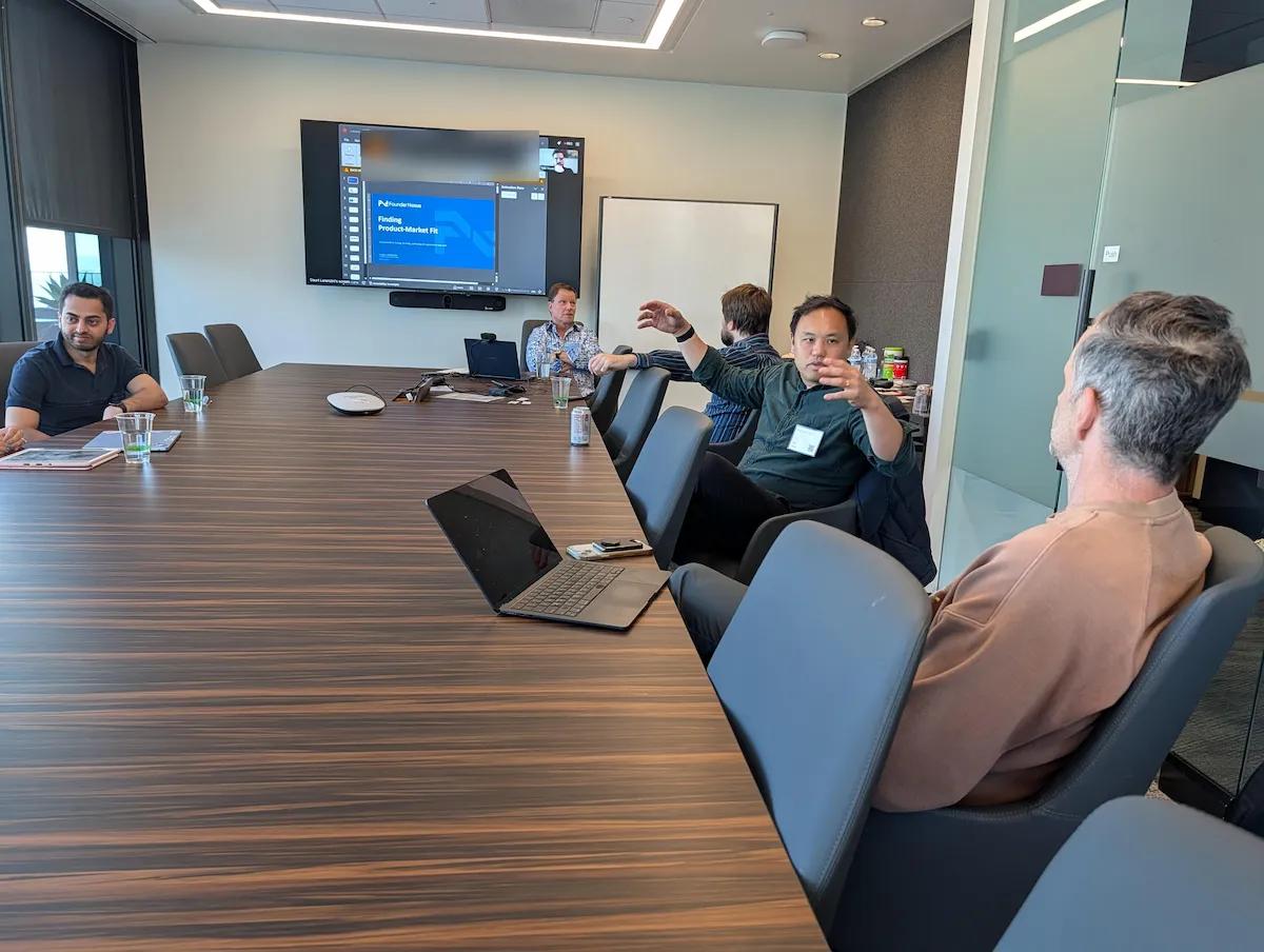 FounderNexus members talking at an in-person event